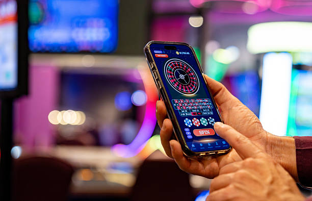 JILI slot game interface on mobile phone showing bet controls and spin button